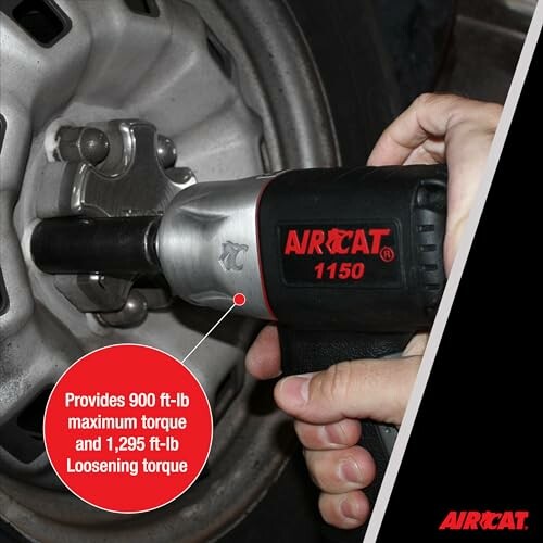 AirCat 1150 impact wrench loosening car wheel lug nut.