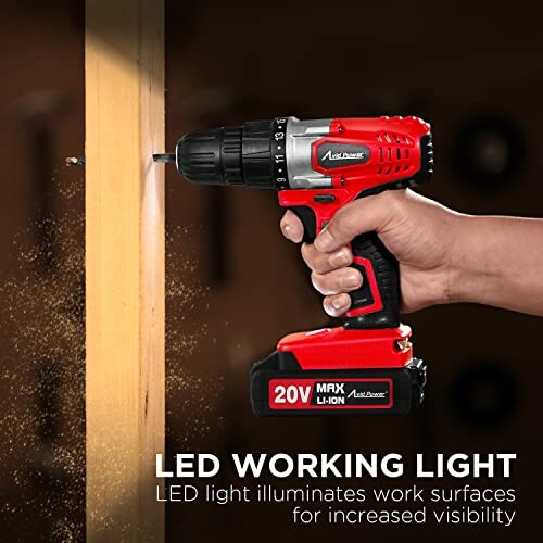 Cordless drill with LED light illuminating a work surface.