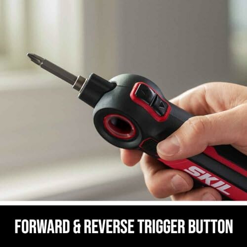 Cordless screwdriver with forward and reverse trigger button