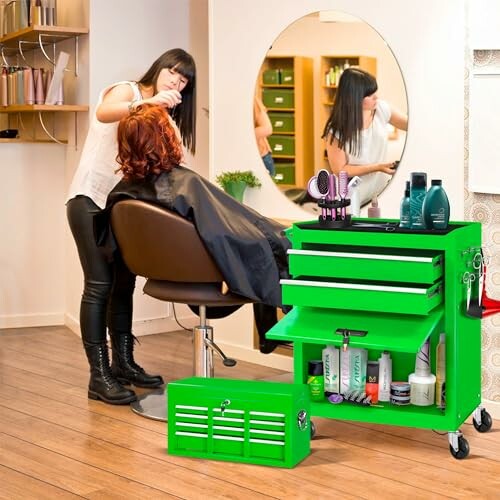 A hair stylist working on a client's hair in a salon with a green tool cart.