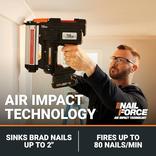 Person using Nail Force air impact nail gun on wall.