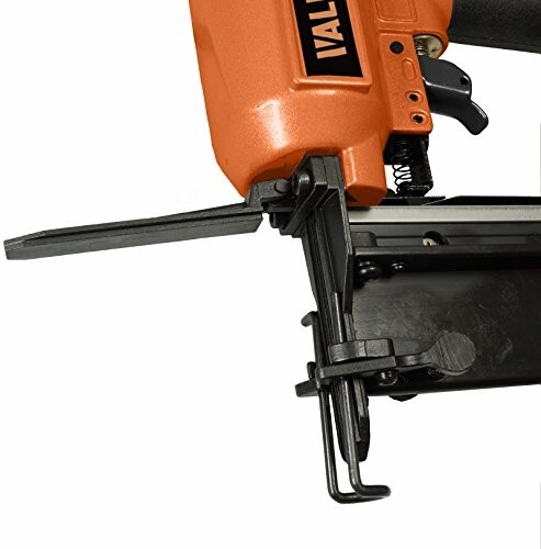 Close-up of an orange nail gun