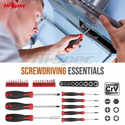 Man using screwdriver set with various tool attachments.